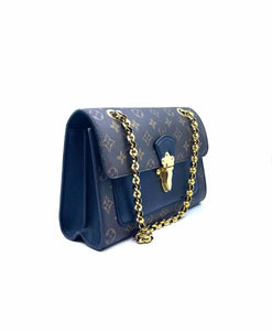 LOUIS VUITTON Brown Coated canvas Monogram Handbag