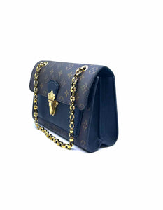 LOUIS VUITTON Brown Coated canvas Monogram Handbag