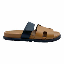 Load image into Gallery viewer, HERMES chypre Size 9 Camel, Black Leather Solid Sandals
